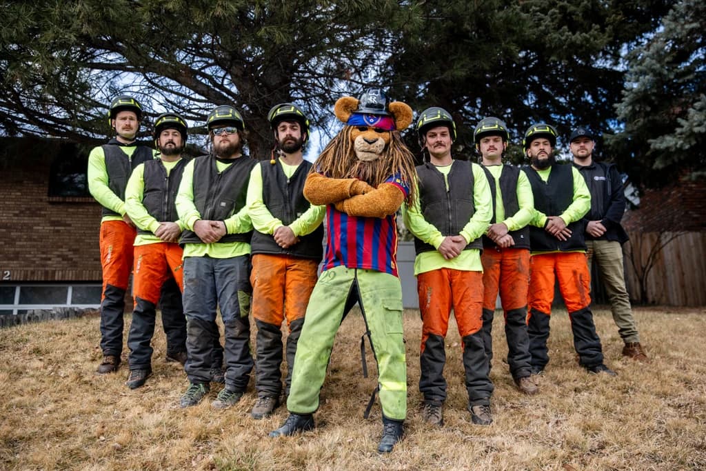 The Clean Cuts Trees crew with Leo the Lion, the Real Salt Lake mascot